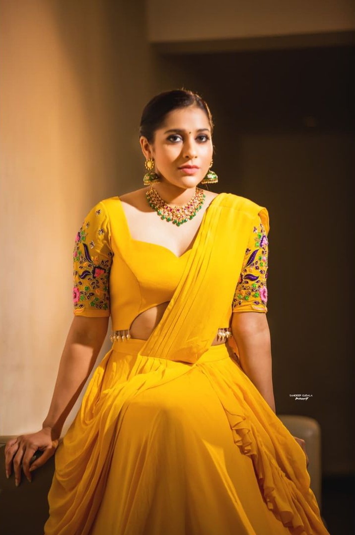 Rashmi Gautham sizzles in yellow color lehenga choli