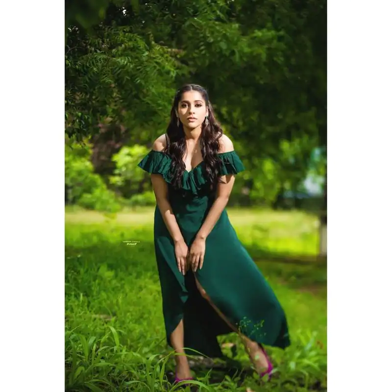 Superb Stylish Anchor Rashmi Gautham stills in green color gown