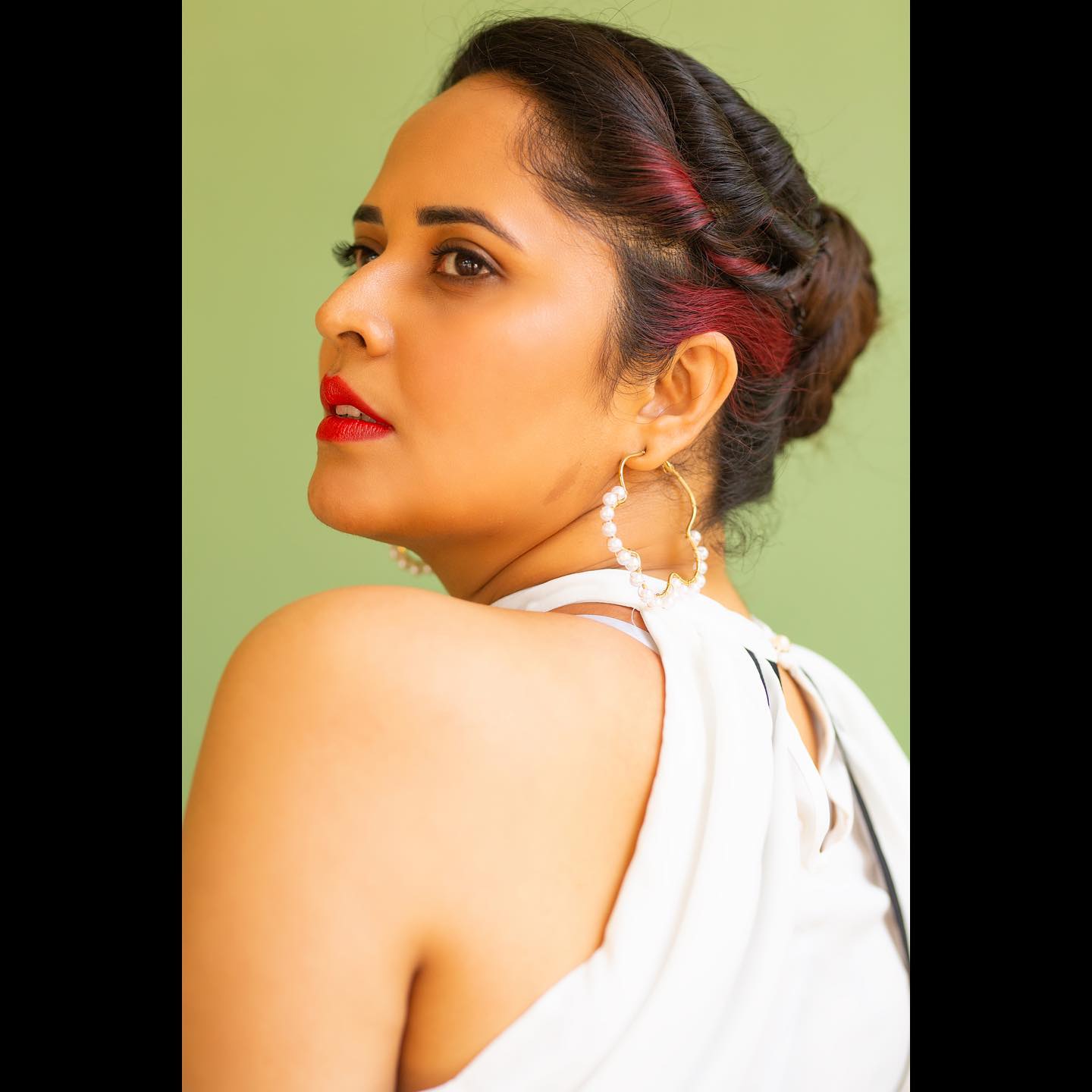 Anasuya Bhardwaj latest stills in white designers dress