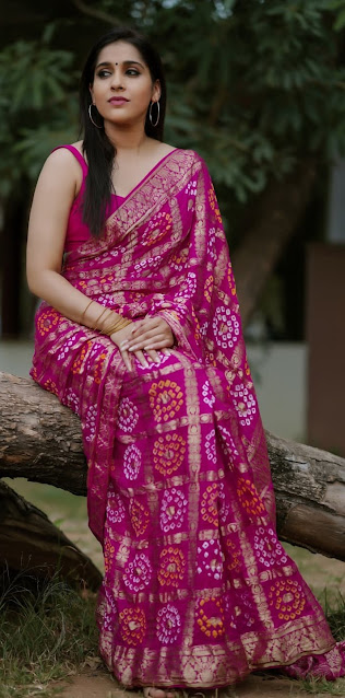 Anchor Rashmi Gautham stills in pink color saree - Glam Actress