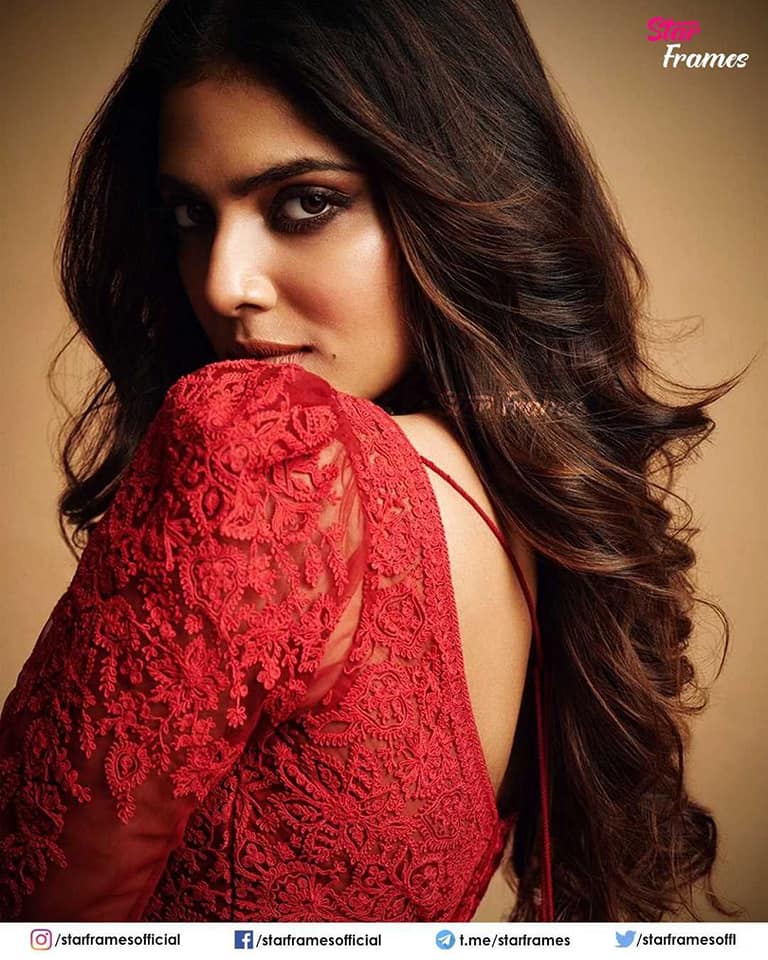 Malavika Mohanan latest stills in red color Indian traditional dress