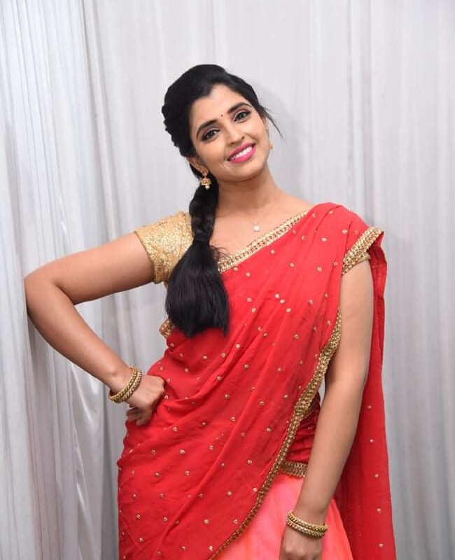 Anchor Shyamala stills in pink and red color half saree - Glam Actress