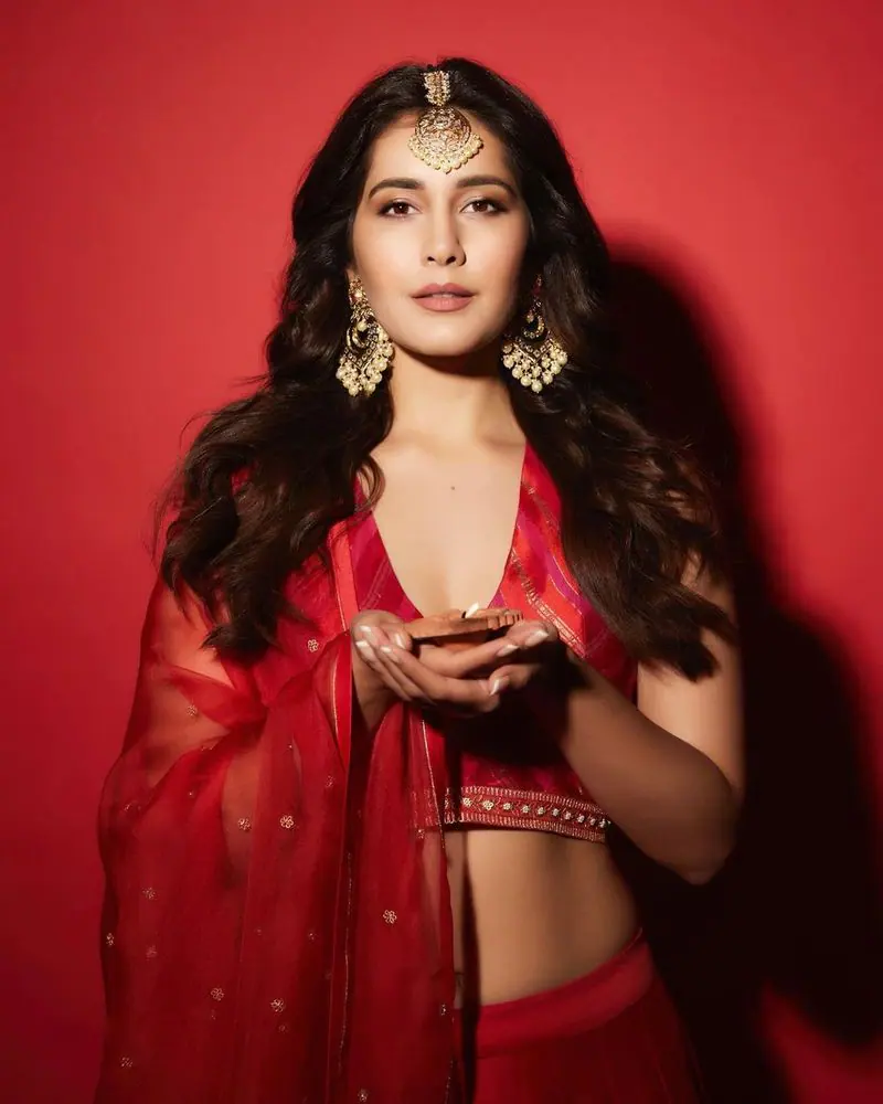 Raashi Khanna stills in red color gagra choli during Diwal