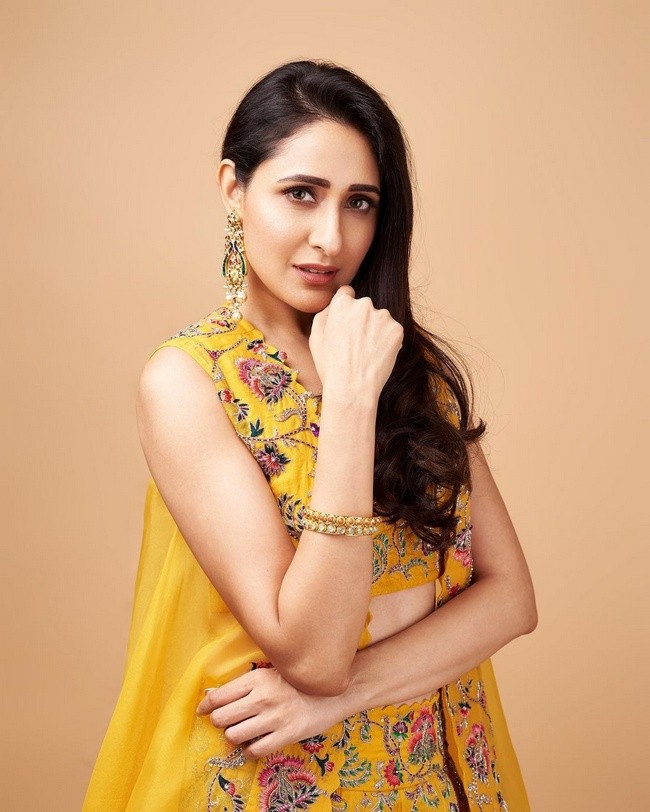 Pragya Jaiswal stills in designer yellow traditional wear