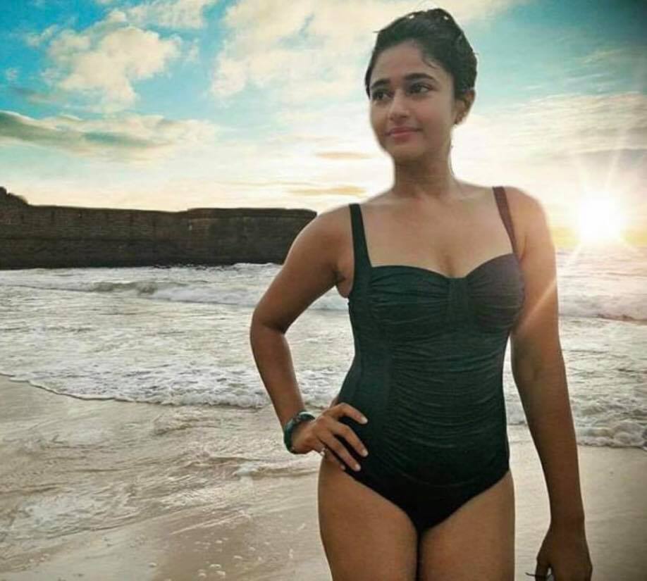 Poonam Bajwa sizzling stills in bikini swimsuit