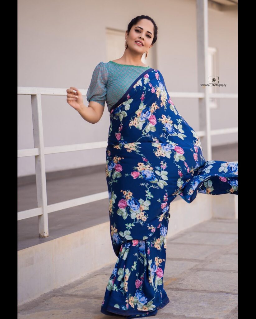 Anasuya Bhardwaj delightful poses in floral saree - Glam Actress