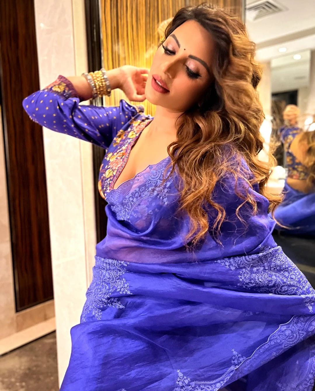 Shama Sikander sparkles in a purple saree