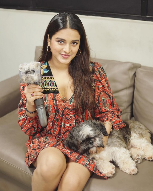 Nidhhi Agerwal poses with her pet