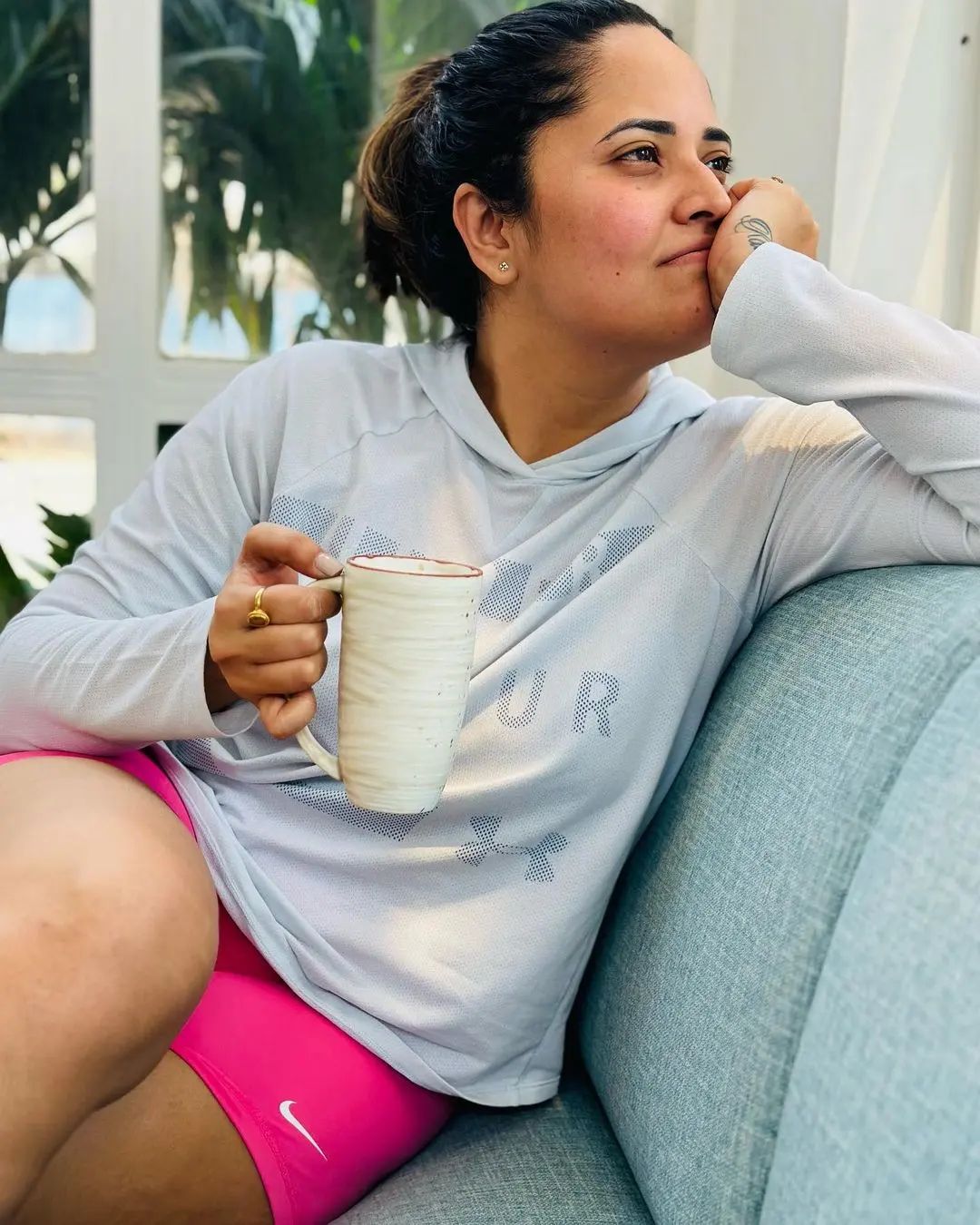 Anasuya Bharadwaj enjoys during coffee
