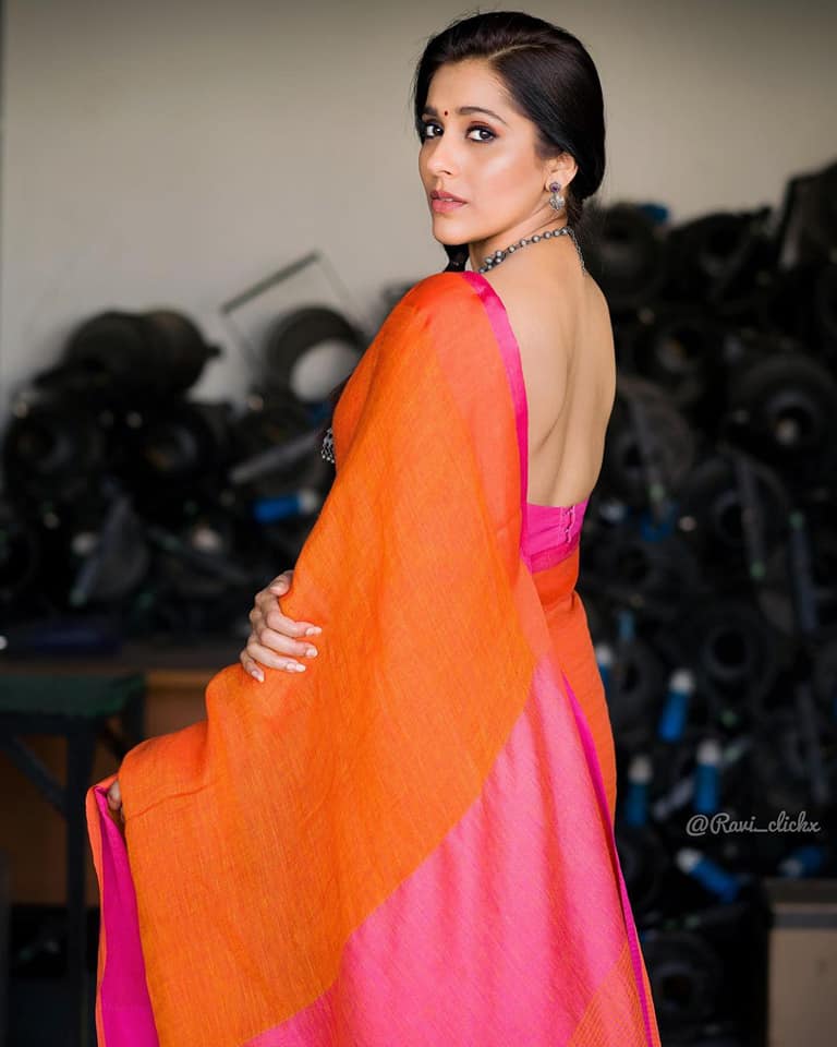Rashmi Gautham latest photoshoot in orange saree