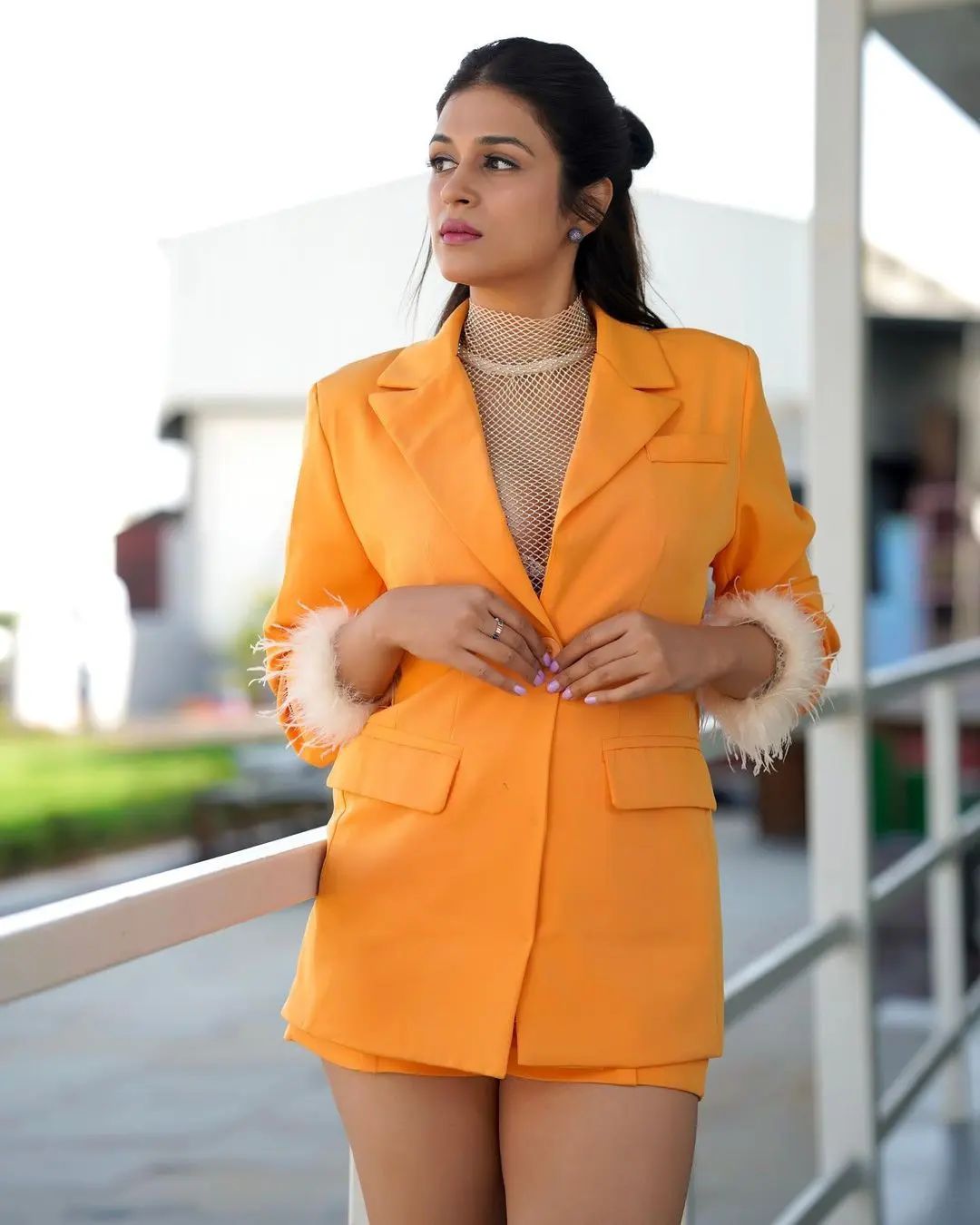 Shraddha Das sizzles in orange color modern outfit