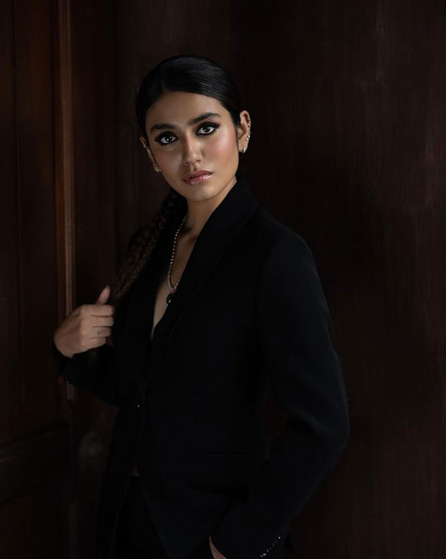 Priya Prakash Varrier hot stills in black coat