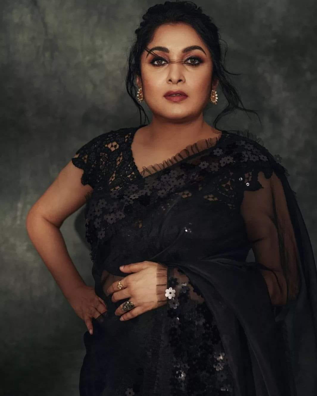 Ramya Krishna looking glamorous in black saree