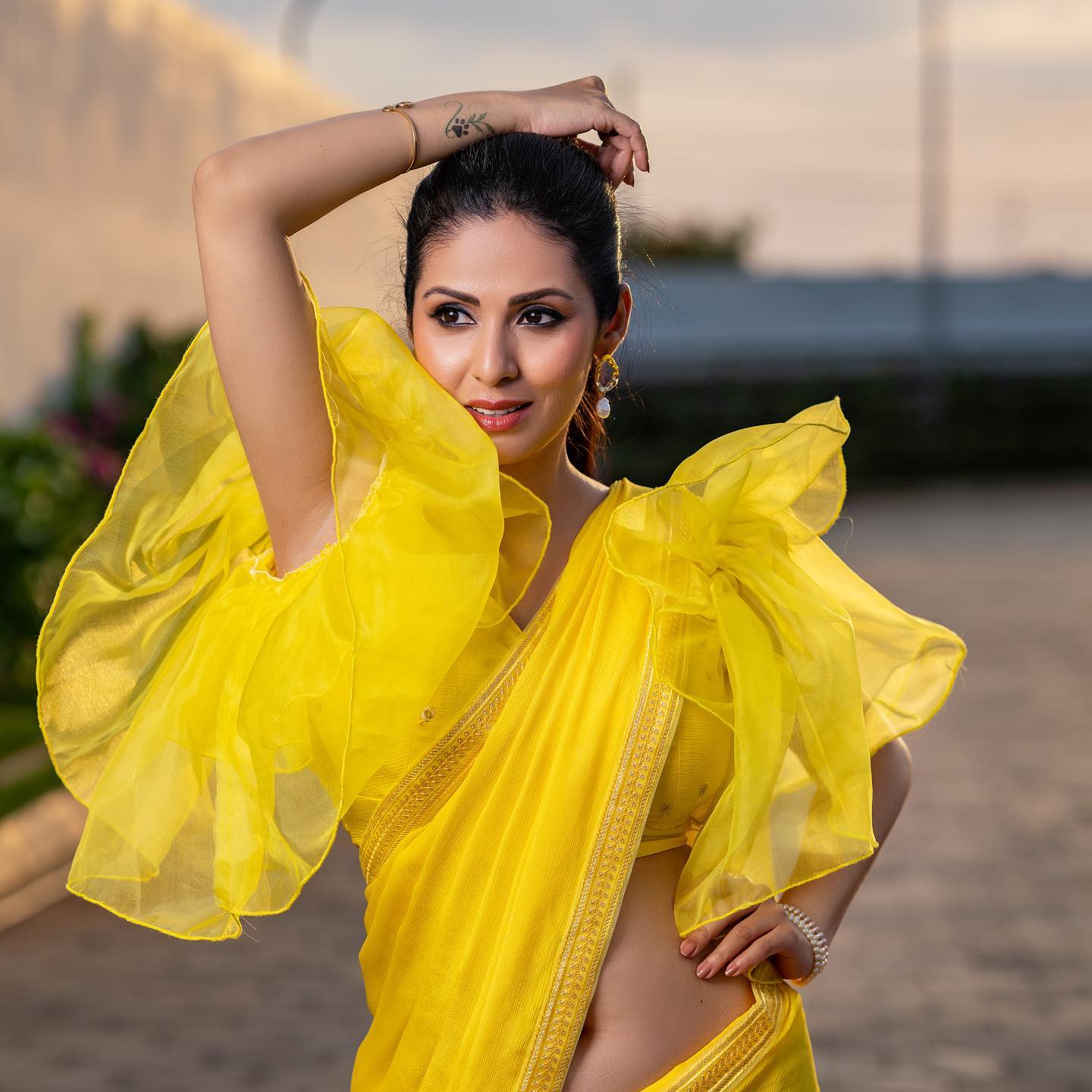 Sadha steamy looks in yellow saree