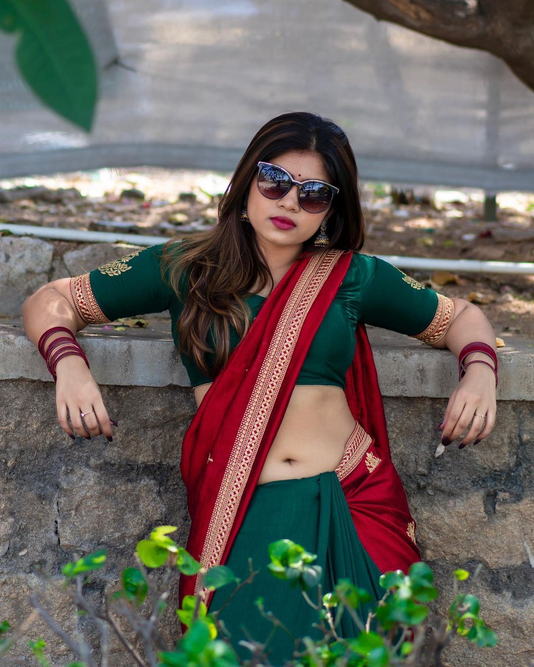 TV Actress Rithu Chowdary stills in half saree