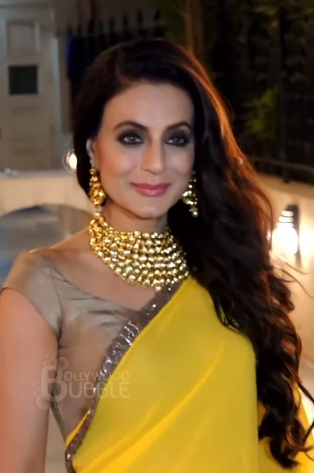 Ameesha Patel dazzles in a adorable yellow saree
